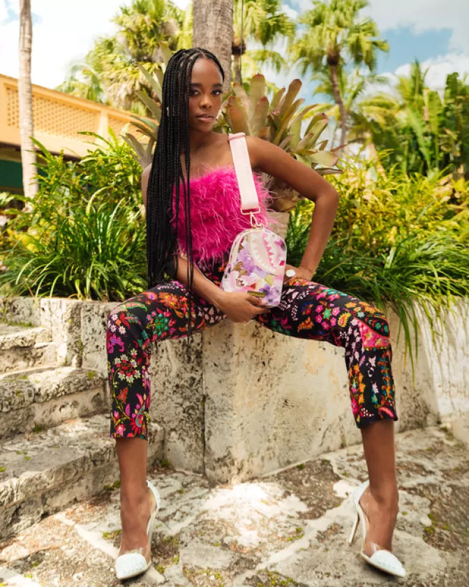 Zaino a tracolla crossbody Sprayground - Design giungla botanica per stile urbano e avventure quotidiane. Collezione Essential con tasche multifunzionali.