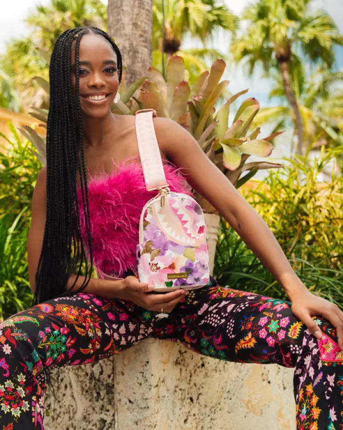 Zaino a tracolla crossbody Sprayground - Design giungla botanica per stile urbano e avventure quotidiane. Collezione Essential con tasche multifunzionali.