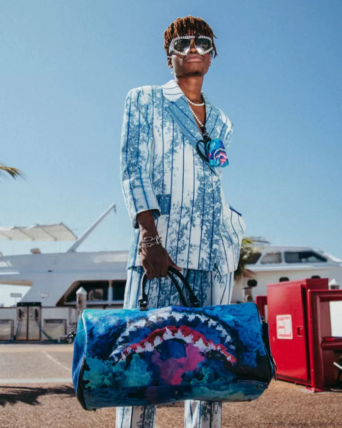 Borsone Sprayground Impermeabile con Design Stile Color Splash - Viaggia con Stile