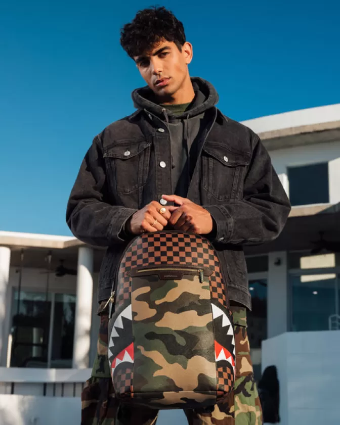 Zaino Sprayground DLXV - Tasche esterne con zip dorato e design squali nella Parigi urbana