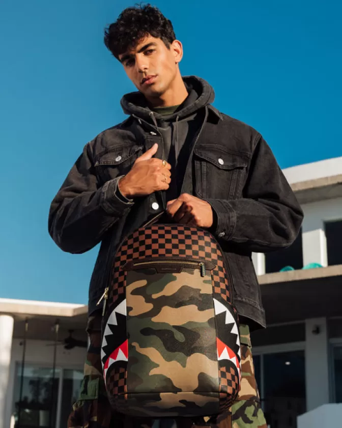 Zaino Sprayground DLXV - Tasche esterne con zip dorato e design squali nella Parigi urbana
