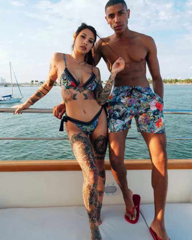 Costumi da Bagno Eleganti Sprayground - Stampa Floreale con Dettaglio Monete, Modello Shoto per Estate