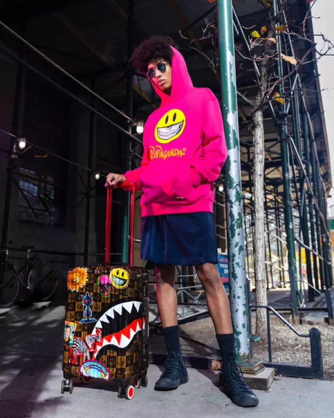 Valigia Cabina Antigurto Sprayground - Edizione Limitata Ron English con Grafiche Pop Art, Bagaglio Rigido da Viaggio Trend del Momento