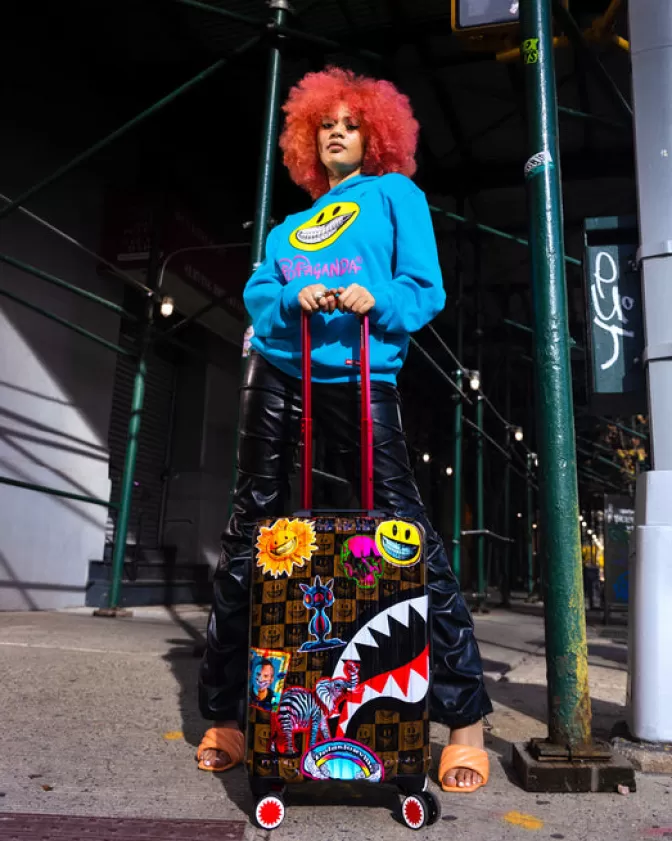 Valigia Cabina Antigurto Sprayground - Edizione Limitata Ron English con Grafiche Pop Art, Bagaglio Rigido da Viaggio Trend del Momento