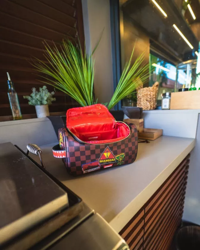 Borsa Cosmetici Sprayground Portavalori - Trousse da Viaggio Premium con Design Esclusivo, Stile Urbano e Funzionalità Moderna | Global Mogul Collection