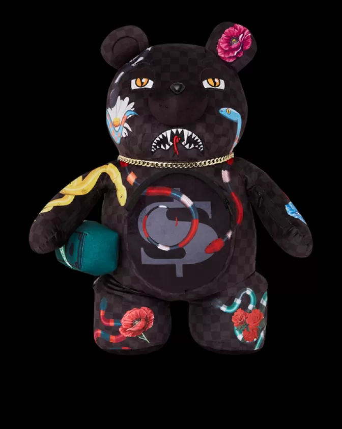 Zaini Sprayground Orsacchiotto Portafortuna • Design Ispirato al Giardino dell'Eden  
Zaino ergonomico con tasche multiple e stampe teddy bear  
Stile unico per bambini e ragazzi 🧸★ (Disponibile in 4 fantasie)