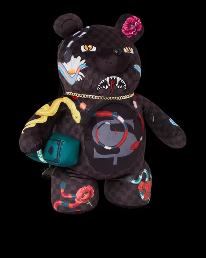 Zaini Sprayground Orsacchiotto Portafortuna • Design Ispirato al Giardino dell'Eden  
Zaino ergonomico con tasche multiple e stampe teddy bear  
Stile unico per bambini e ragazzi 🧸★ (Disponibile in 4 fantasie)