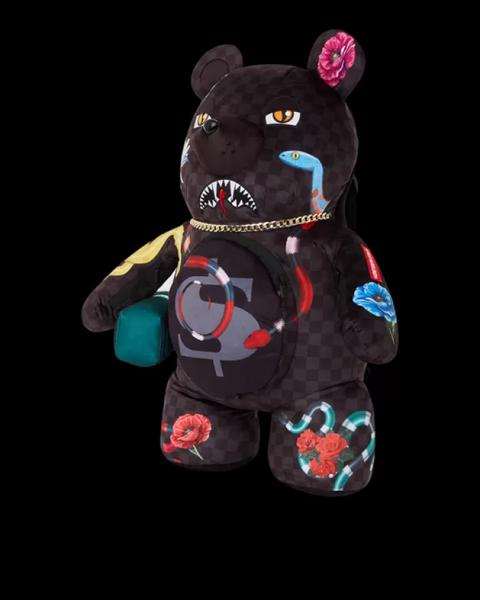 Zaini Sprayground Orsacchiotto Portafortuna • Design Ispirato al Giardino dell'Eden  
Zaino ergonomico con tasche multiple e stampe teddy bear  
Stile unico per bambini e ragazzi 🧸★ (Disponibile in 4 fantasie)