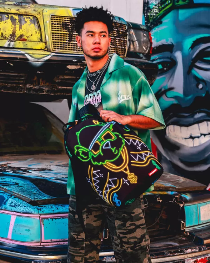 Zaino Sprayground Urbano Stile Orso Banconote con Luci della Città - Design Unico per Strada Metropolitana