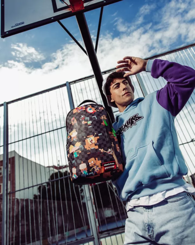 Zaino Sprayground X Nickelodeon: Checkbreak DLXV Impermeabile con Design Retrò per Scuola e Viaggi - Stile Urbano Resistente
