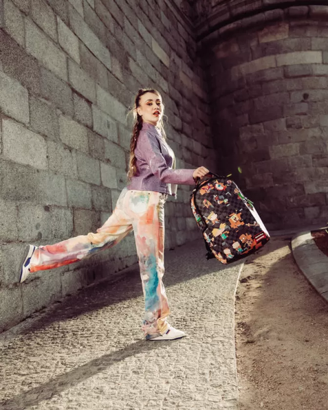 Zaino Sprayground X Nickelodeon: Checkbreak DLXV Impermeabile con Design Retrò per Scuola e Viaggi - Stile Urbano Resistente