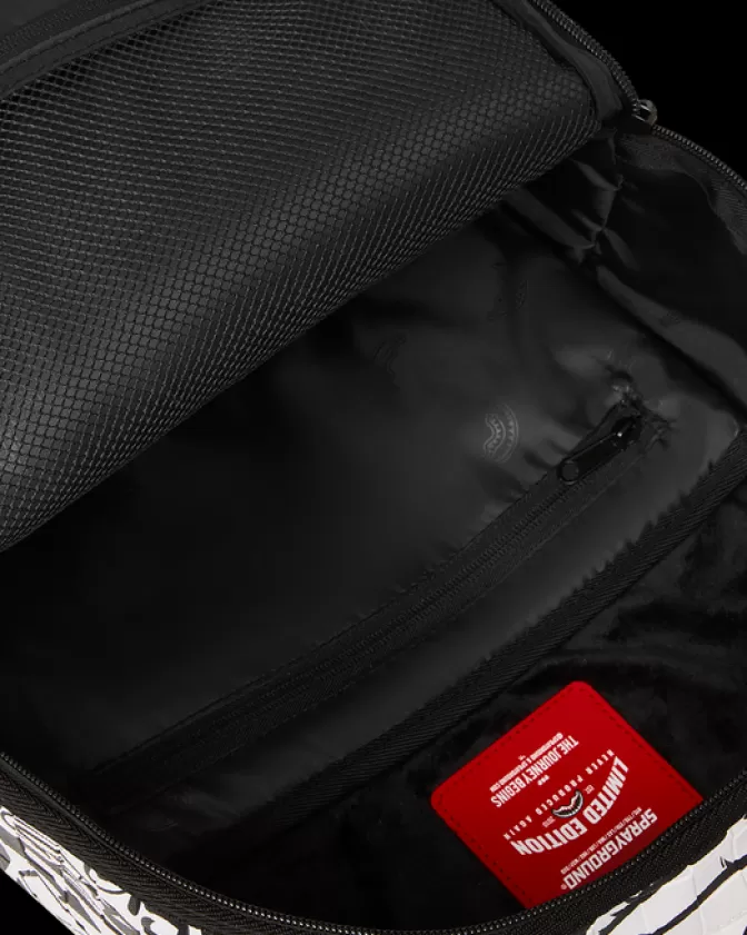 Zaino Sprayground DLXV: Il Compagno Perfetto per le Feste Post-Stipendio 

(Note: 