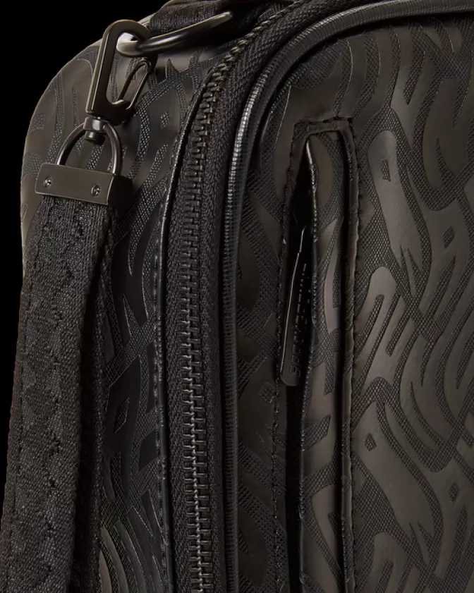 SPRAYGROUND - KIT VIP DA VIAGGIO: LUSSO IN VOLO CON BORSA TESORIERE ESCLUSIVO