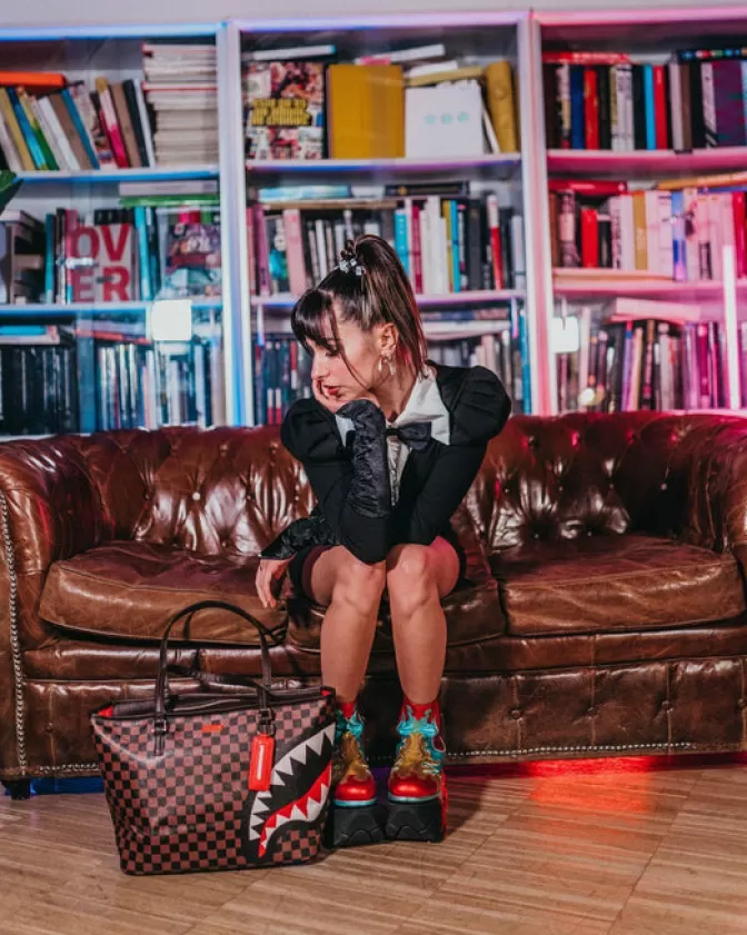 Sprayground Split the Check - Borsa Tracolla Multifunzione con Design Condiviso