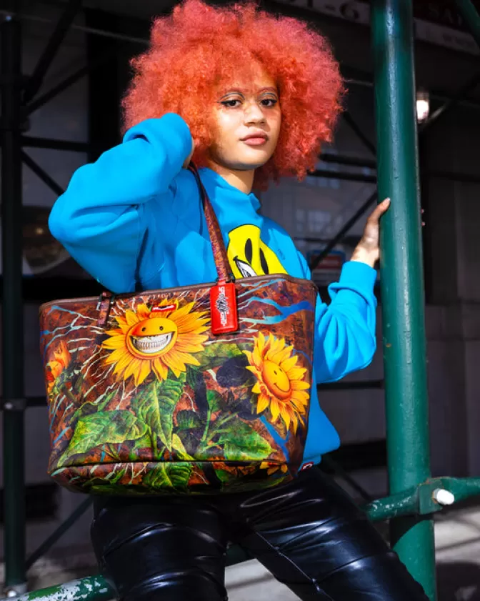 Sprayground Borsa Tracolla con Stampa Girasole Sorridente - Edizione Esclusiva Ron English