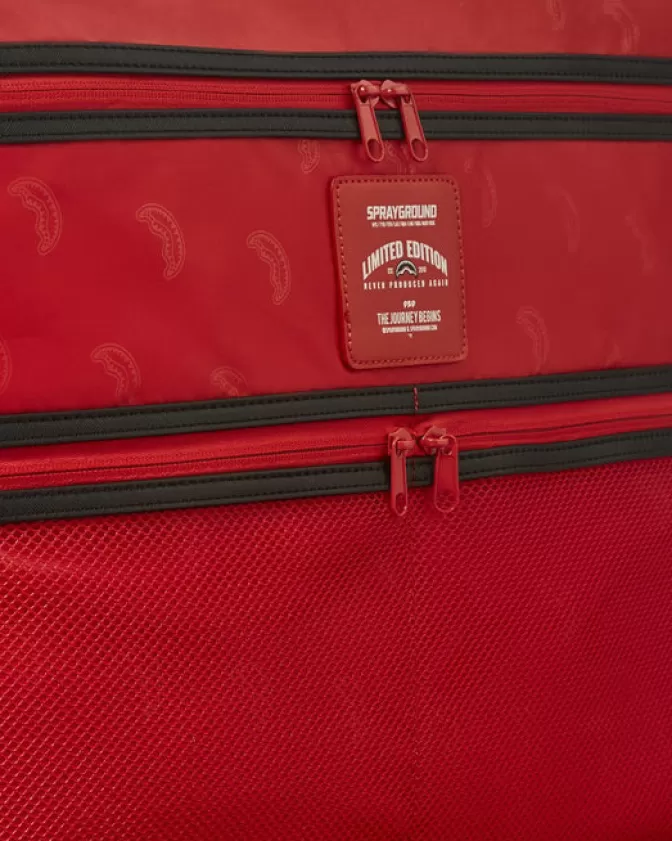 Valigia a mano Sprayground XTC - Squali di Parigi con Stile Avventuroso per Viaggiatori Intrepidi 

Design Esclusivo Jet Set: Bagaglio Cabina Moderno con Tema Squali Urbani 

Viaggia con Stile - Sprayground Collezione Parisienne per Globetrotter Fashion
